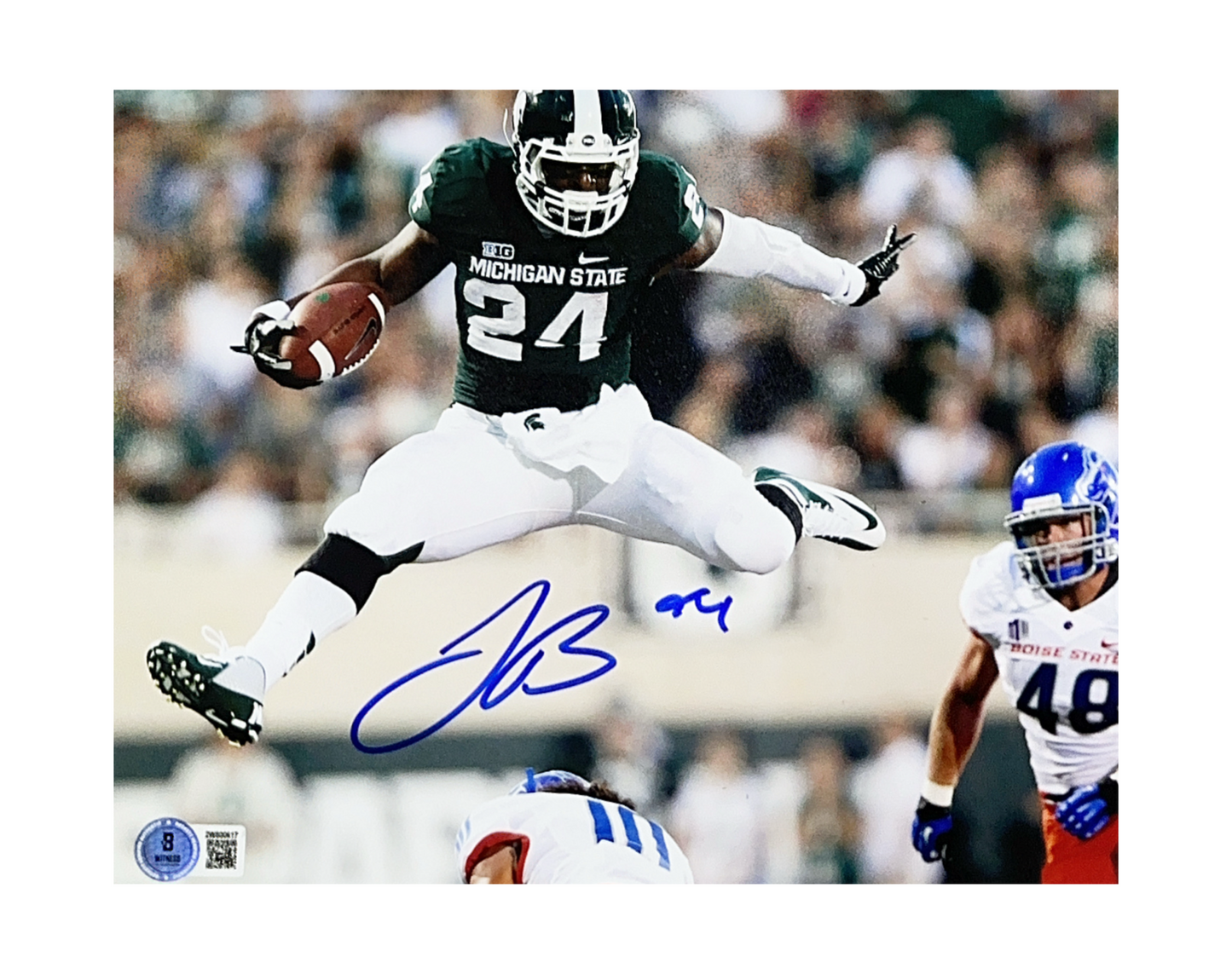 Leveon Bell Autographed Michigan State Green Jersey Hurdle Horizontal 8x10 Beckett