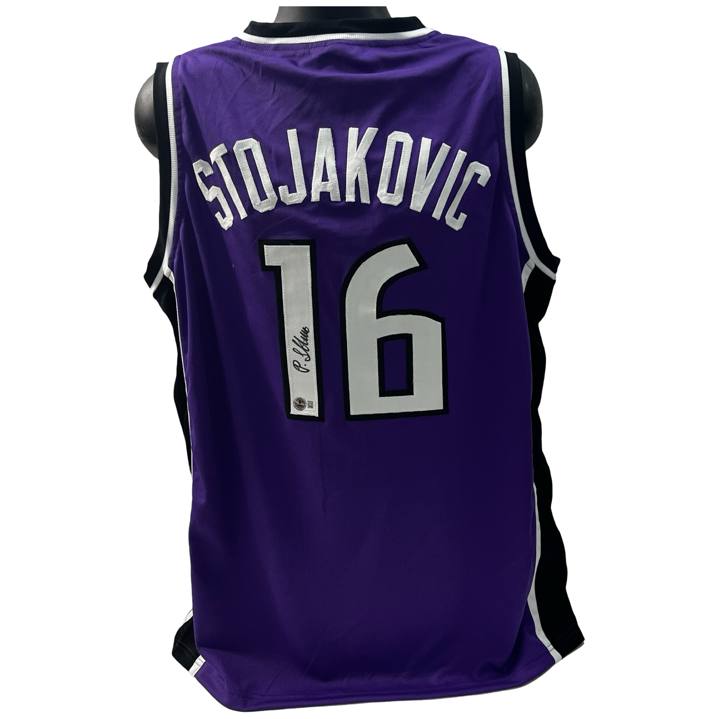 Peja Stojakovic Autographed Sacramento Kings Purple Jersey Beckett