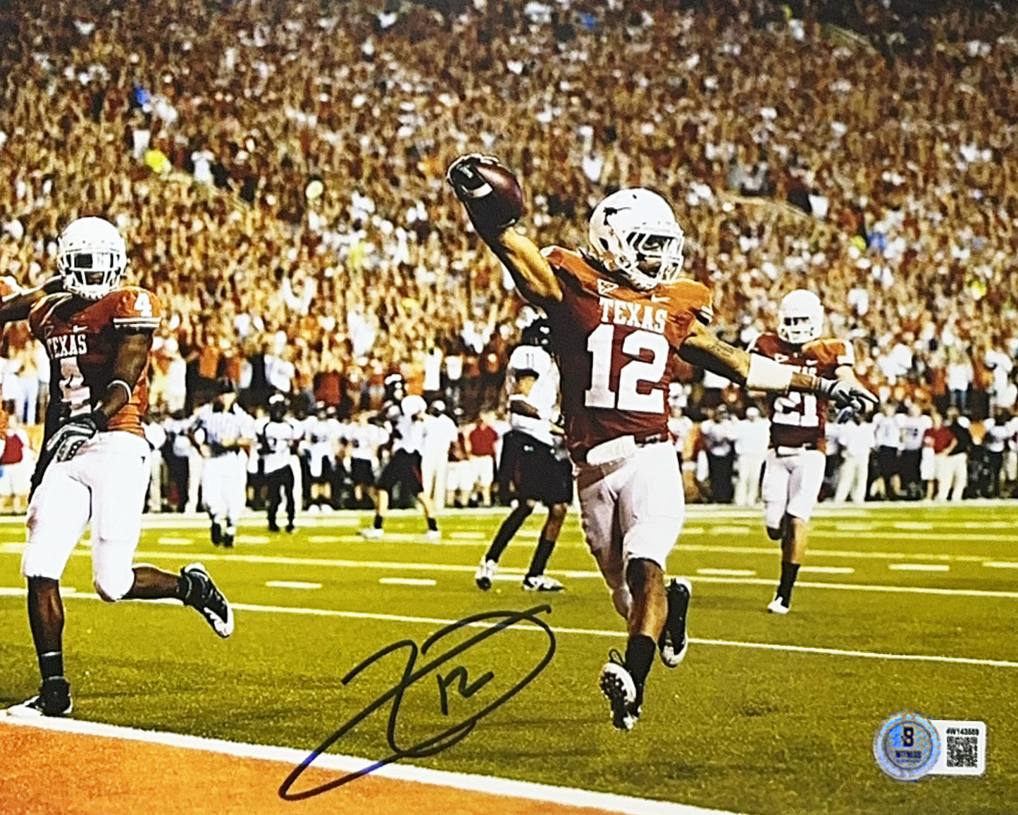 Earl Thomas III Autographed Texas Longhorns Touchdown 8x10 Photo Beckett