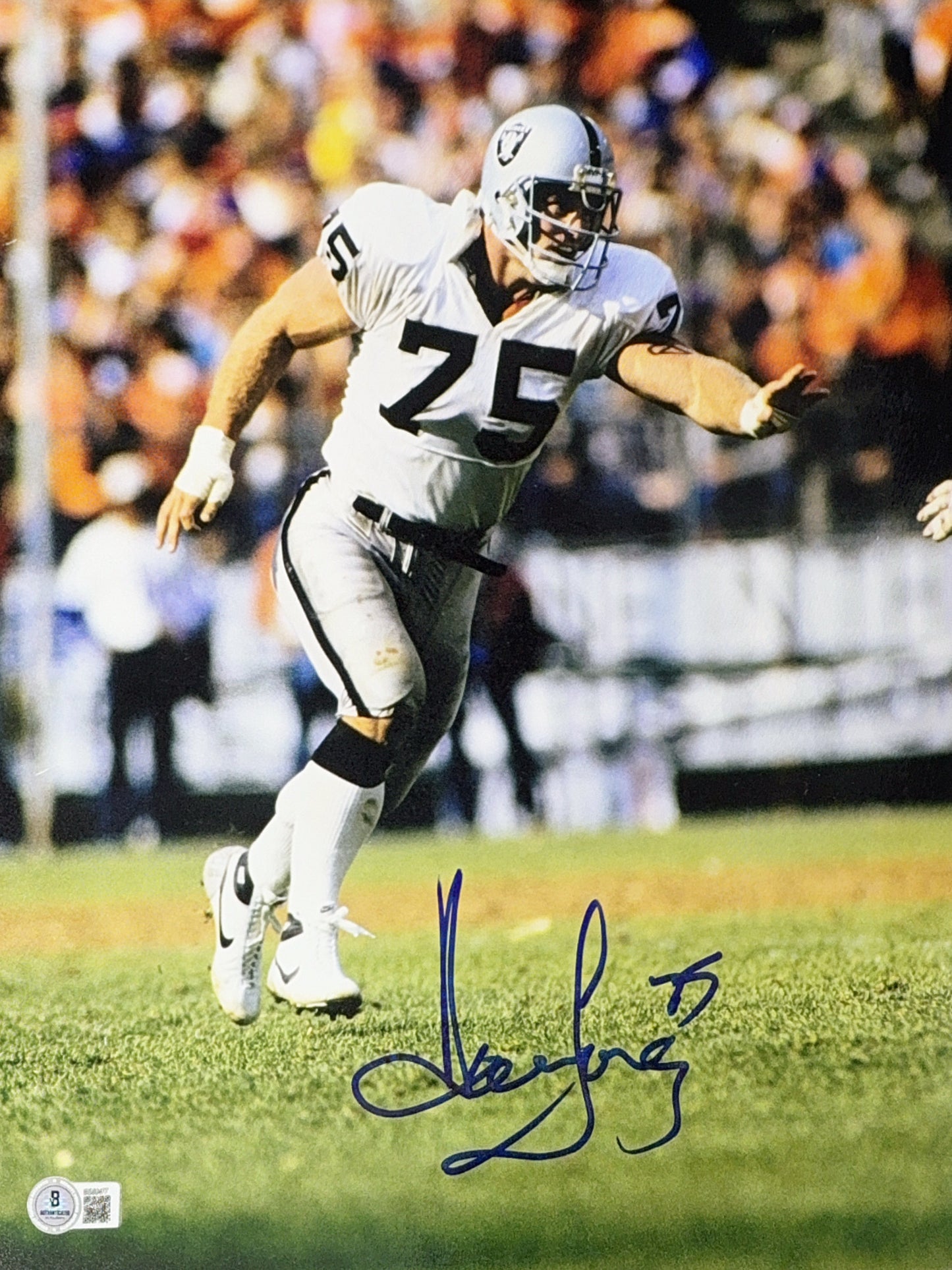 Howie Long Autographed Oakland Raiders Running White Jersey 11x14 Beckett