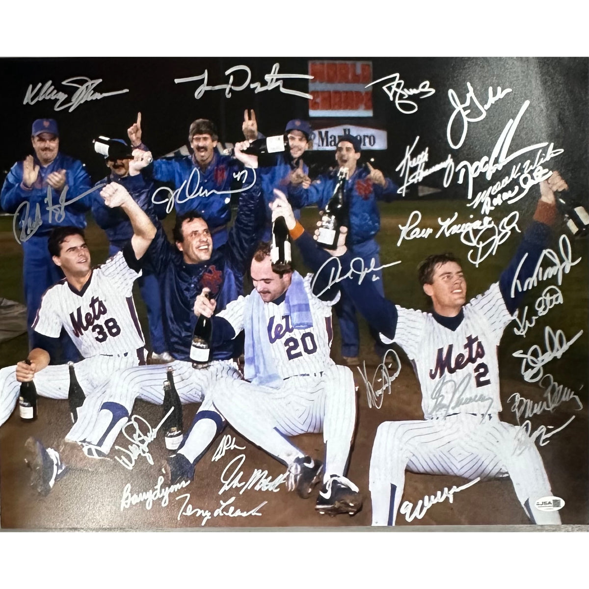 1986 New York Mets Team Autographed Team Sitting Champagne Celebration 16x20 Horizontal JSA