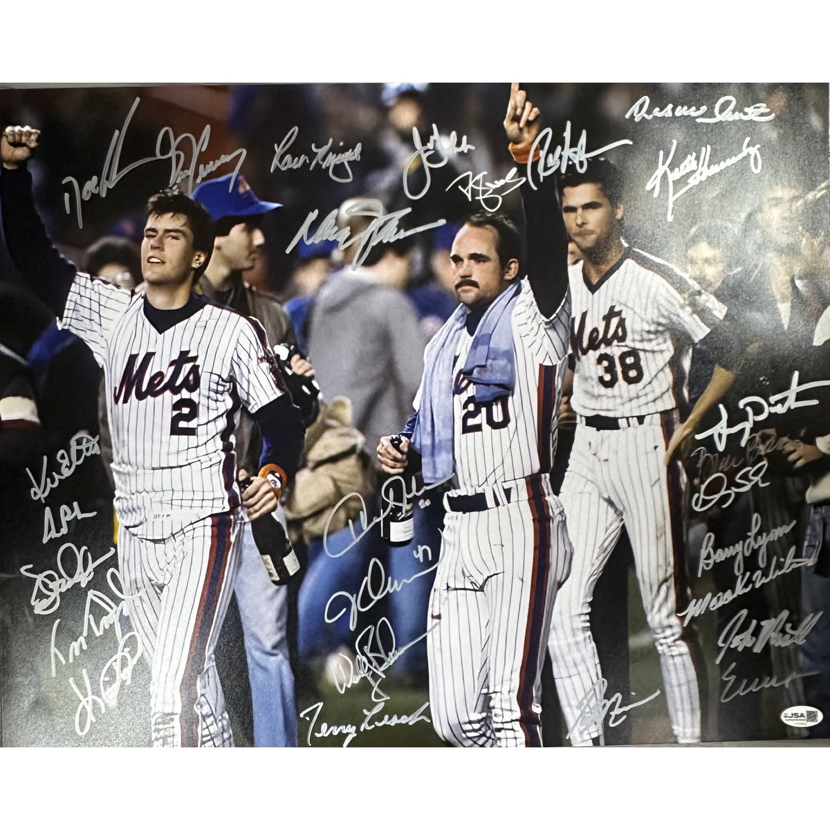 1986 New York Mets Team Autographed Walking With Champagne 16x20 Horizontal JSA