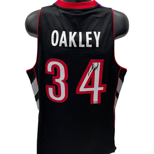 Charles Oakley Autographed Toronto Raptors Black 1999-00 Mitchell & Ness Swingman Jersey Steiner CX