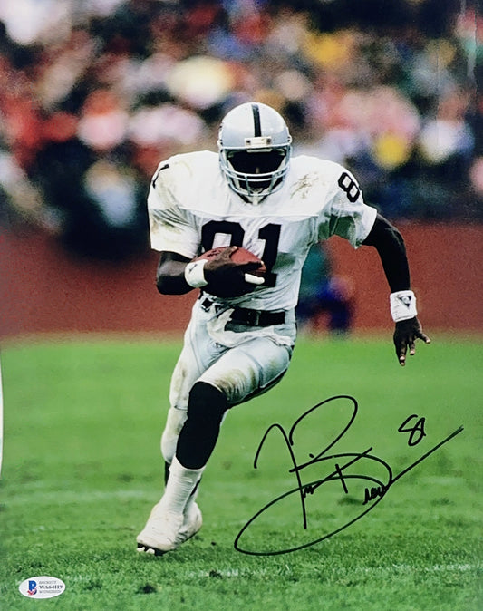 Tim Brown Autographed Oakland Raiders Rush 11x14 Beckett