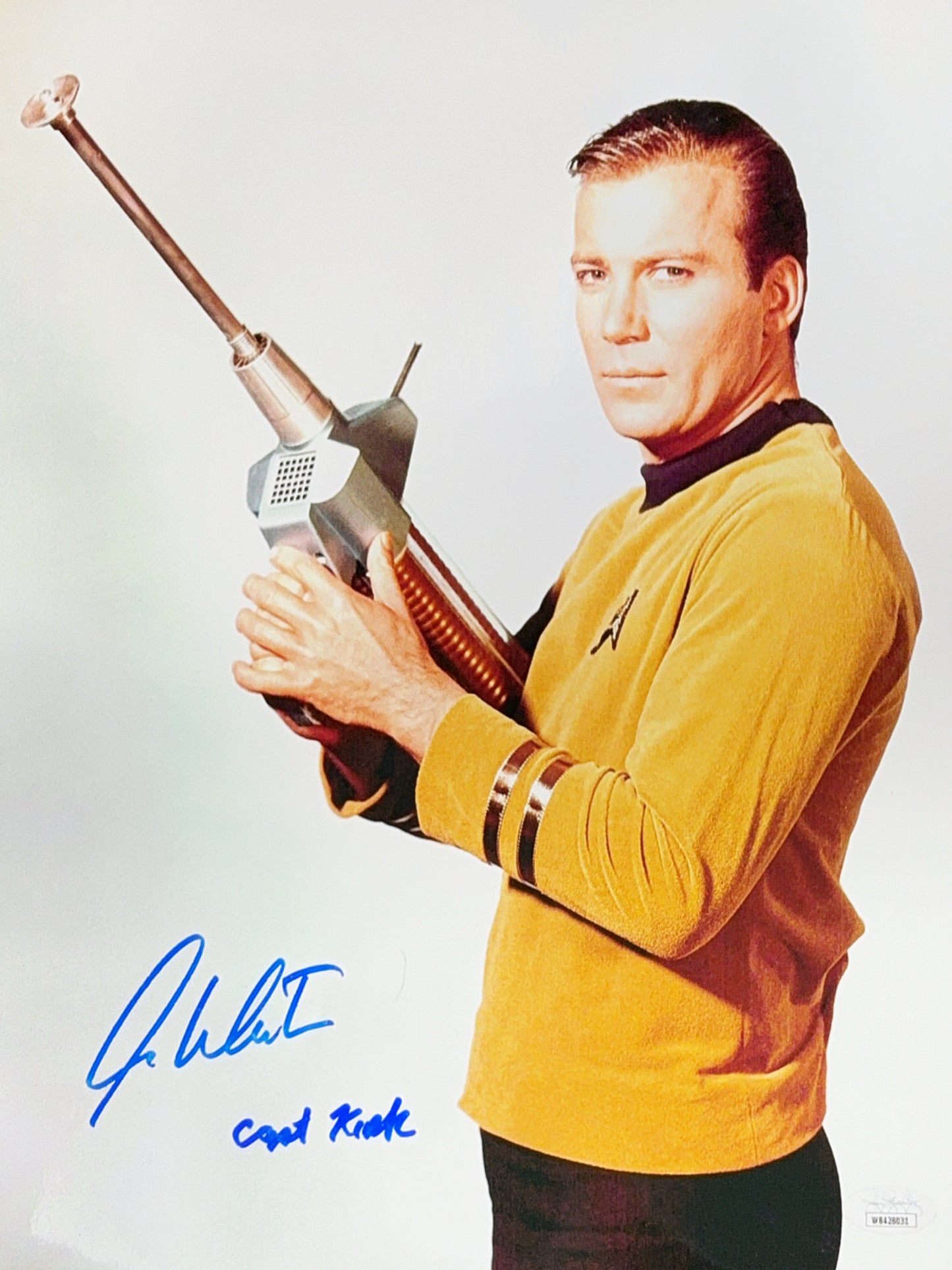 William Shatner Autographed Star Trek "Capt Kirk" Inscribed Gun White Background Vertical 11x14 JSA