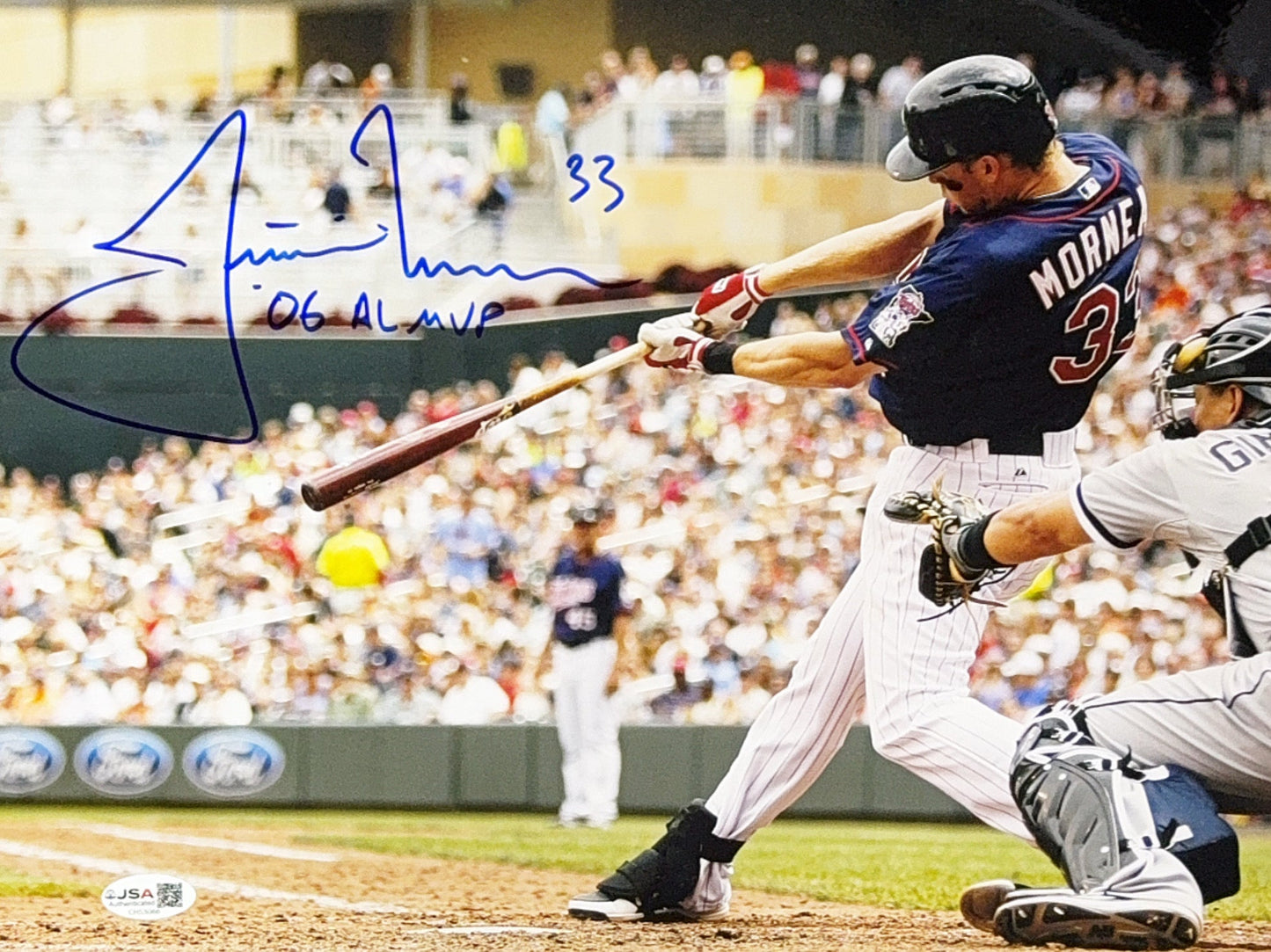 Justin Morneau Autographed Minnesota Twins Hitting 06 AL MVP 11x14 JSA
