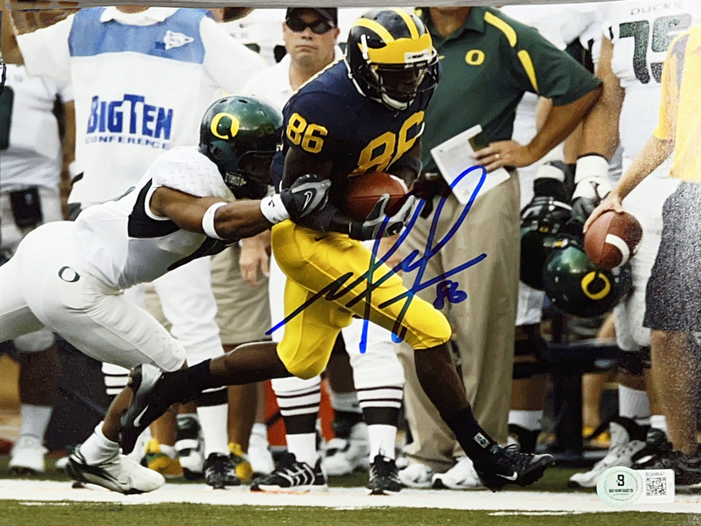 Mario Manningham Autographed Michigan Wolverines Run Horizontal 8x10 Beckett