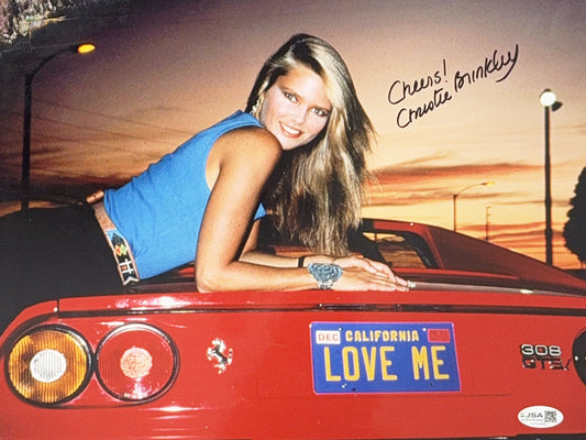 Christie Brinkley Autographed Red Car 11x14 JSA