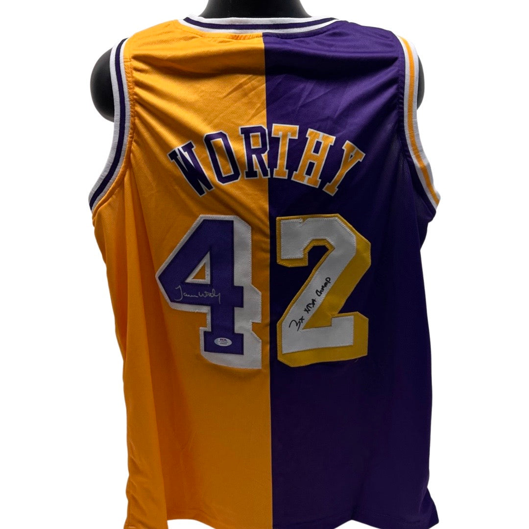 James Worthy Autographed Los Angeles Lakers Yellow/Purple Split Jersey “3x NBA Champ” Inscription PSA