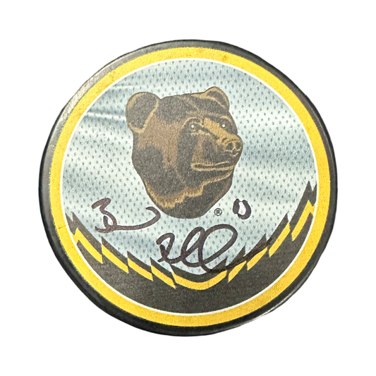 Brad Marchand Autographed Boston Bruins Logo Puck JSA