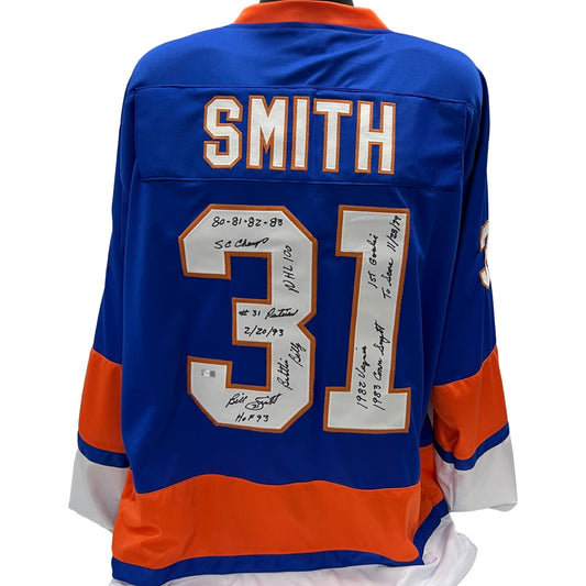 Billy Smith Autographed New York Islanders Blue Jersey "HOF 93, SC Champs 80 81 82 83, NHL 100, #31 Retired 2/20/93, Battlin Billy, 1st Goalie to score 11/28/79, 1982 Vezina Trophy, 1983 Conn Smythe" Inscriptions Steiner CX