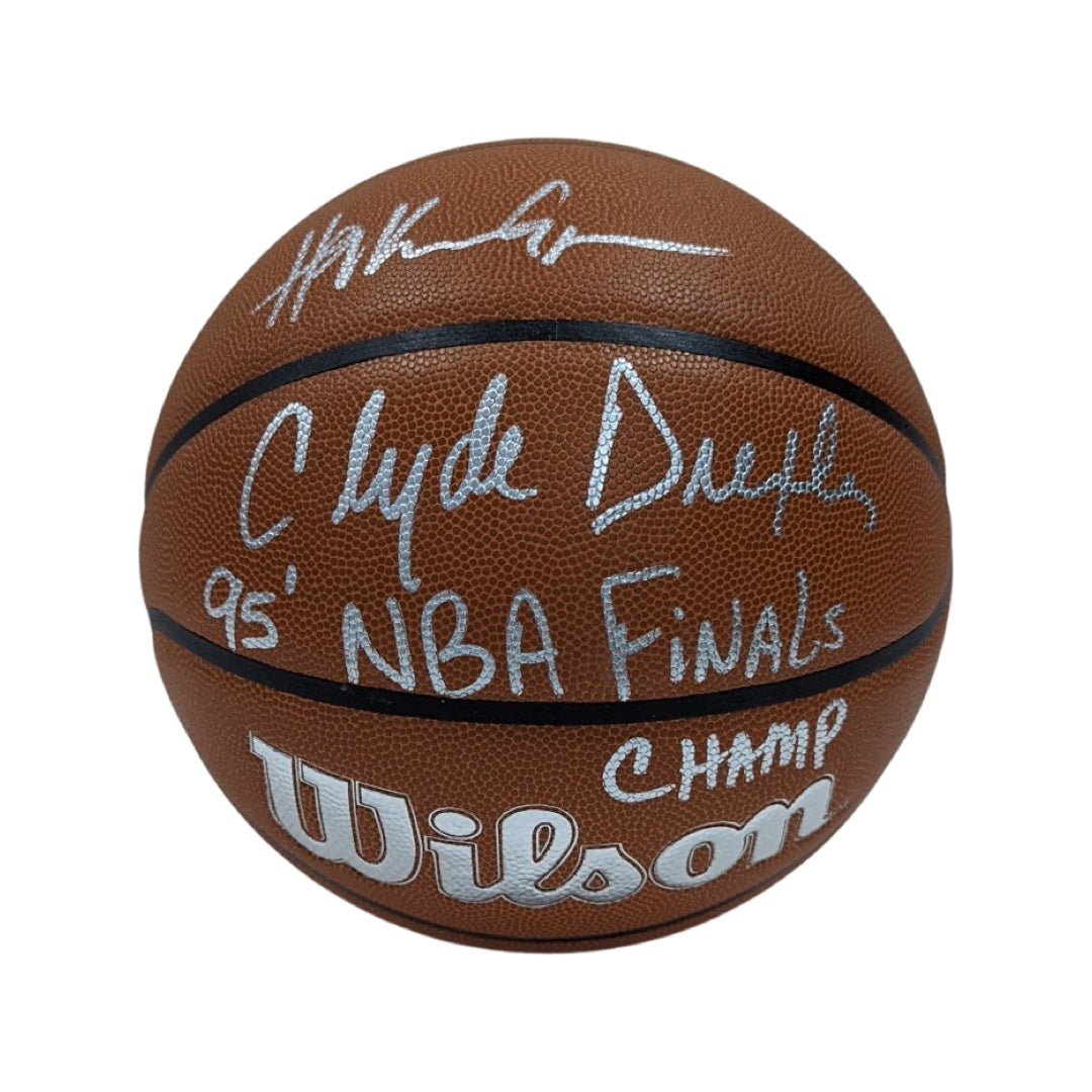 Hakeem Olajuwon & Clyde Drexler Autographed Houston Rockets Wilson NBA 75 Logo Basketball 95 NBA Finals Champ Inscription Steiner CX