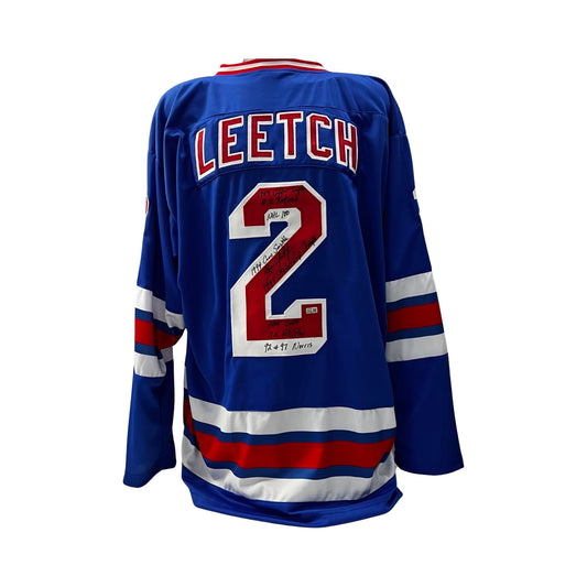Brian Leetch Autographed New York Rangers Blue Jersey 1989 Calder Trophy, #2 Retired, NHL 100, 1994 Conn Smythe, 1994 Stanley Cup Champs, HOF 2009, 11x All Star, 92 & 97 Norris Inscriptions Steiner CX